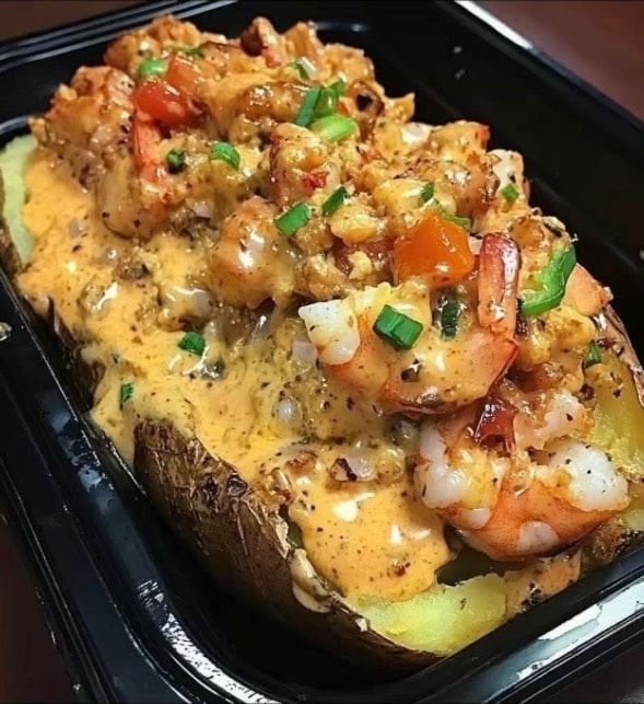 Smothered chicken with rich gravy over rice